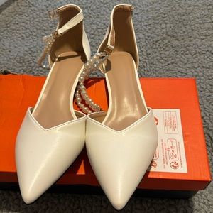 Never worn White 3 inch heels with pearl stripes size 10 come with box